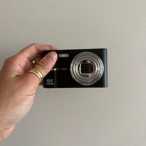 Black Digital Camera with Silver Lens